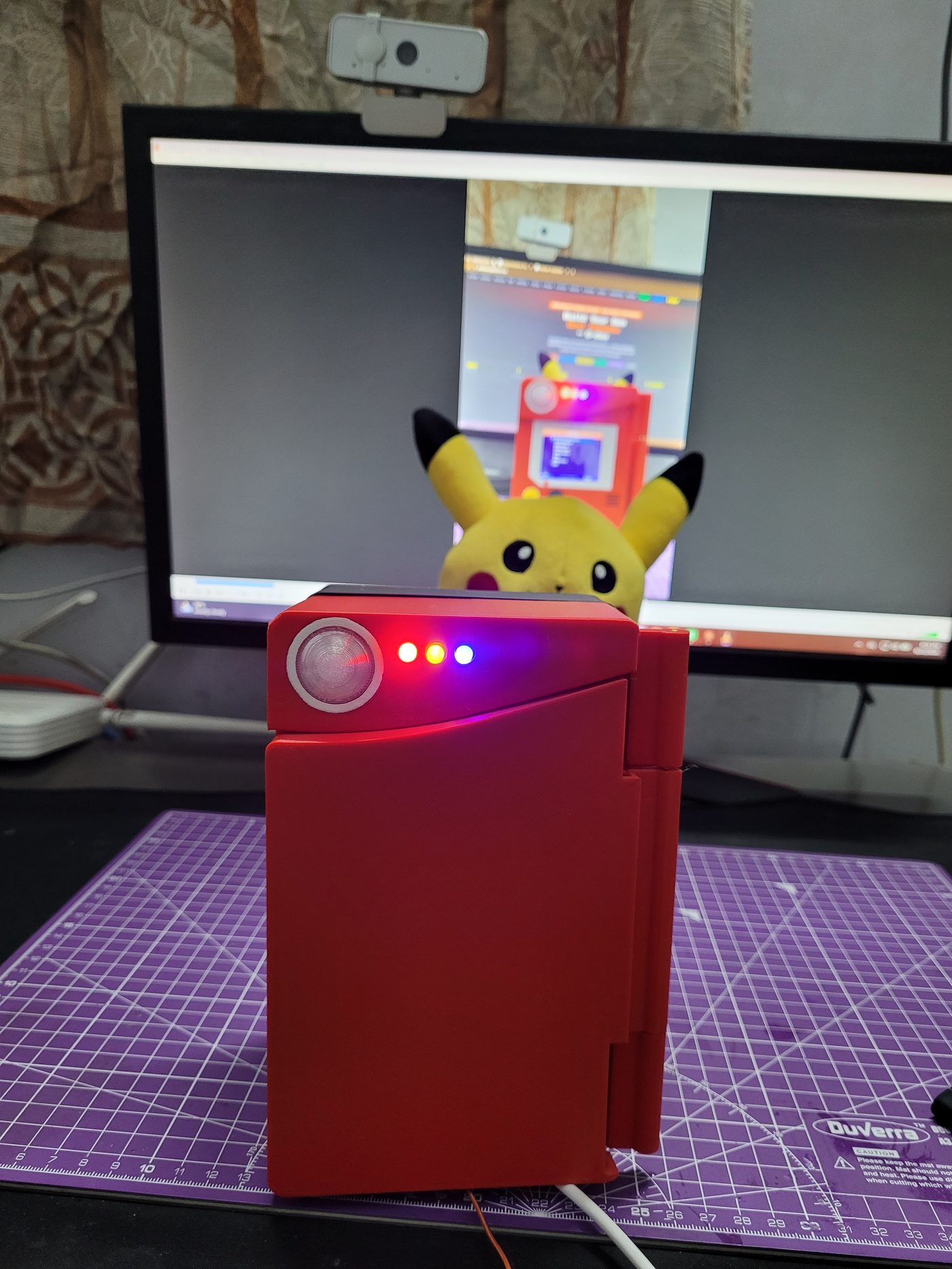 Q-dex standing upright with indicator LEDs lit